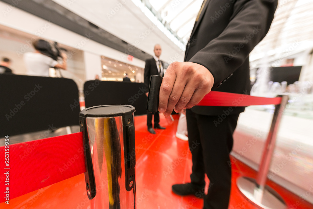 Security personnel managing VIP event access